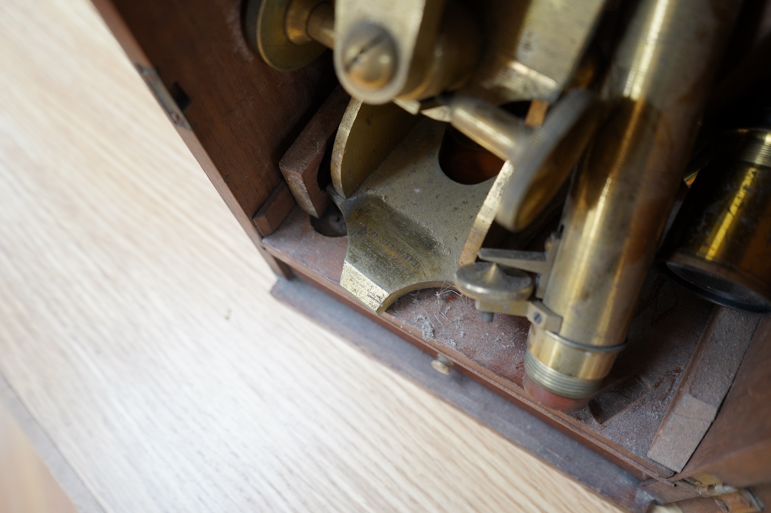 A mahogany cased late 19th century brass microscope by J.H. Steward, 456 West Strand London, with a drawer underneath containing a few prepared microscope slides, case 27cm high, 19.5cm wide, 15.5cm deep. Condition - poo